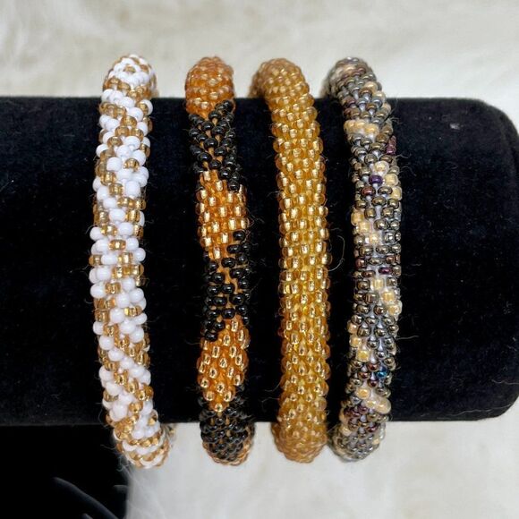 HAND CRAFTED in Nepal Beaded Bracelets (set of 4) GOLD2 - Picture 1 of 4